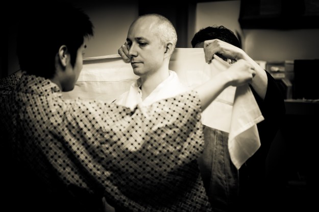 Diego Pellecchia getting dressed for the rehearsal of the Noh 'Kiyotsune'. Photo: Stéphane Barbery